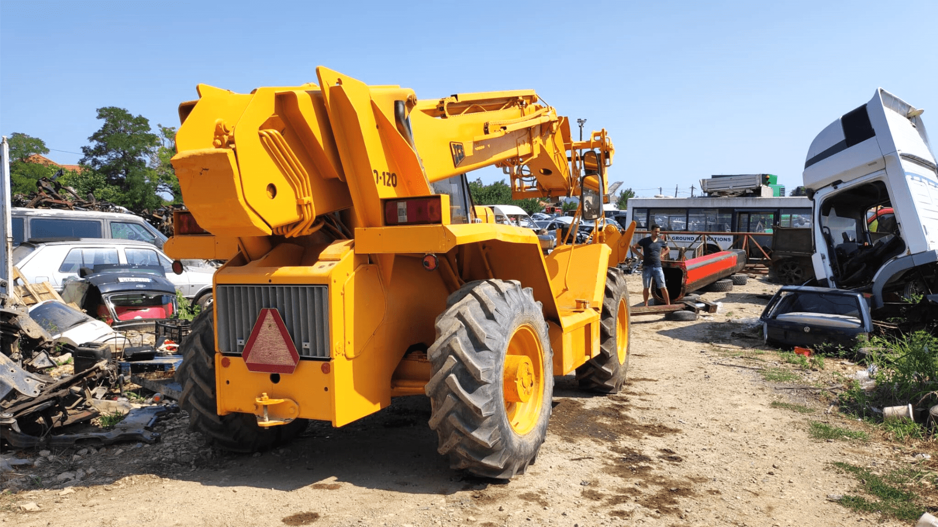 Using a Telehandler for Handling Heavy Steel Tubes